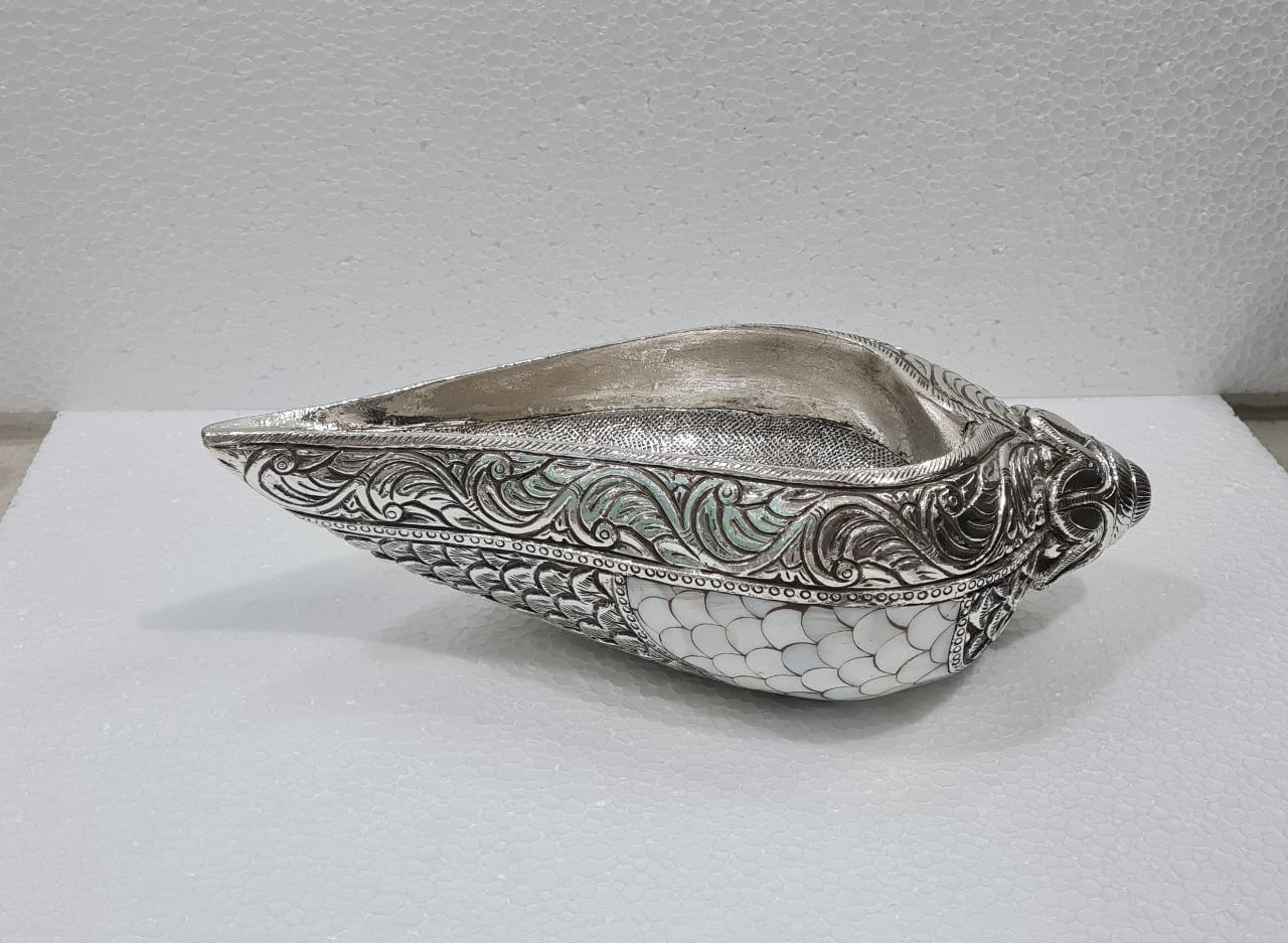 Handcrafted silver carving work